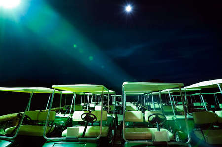 Moon, street lamp and  golf carts in South Dakota.  Available for stock.