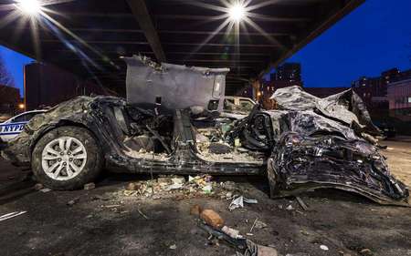 Concrete Landscapes a personal series re-examining what is meant by Landscape Photography.. the intersection of nature and man in an urban environment.  Car damaged from a building explosion in Harlem, NYC.