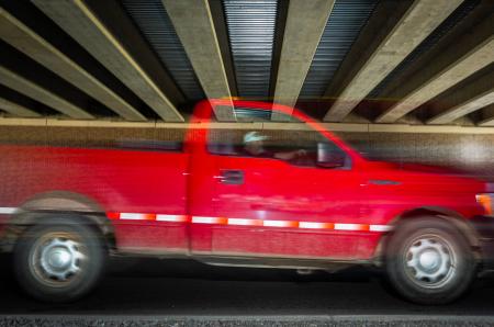 Big Beaver- Michigan:  Michigan is all about cars. I was walking around and noticed this location under an overpass where car after car keep coming.  I found the ceiling to be a wonderful backdrop to photograph all the motion. 